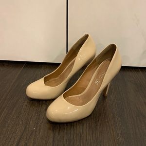 Nude patent leather heels